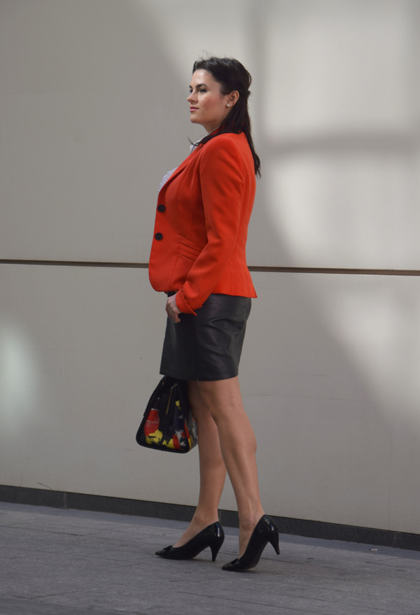 Looks for the office: Black skirt, white shirt and orange red blazer