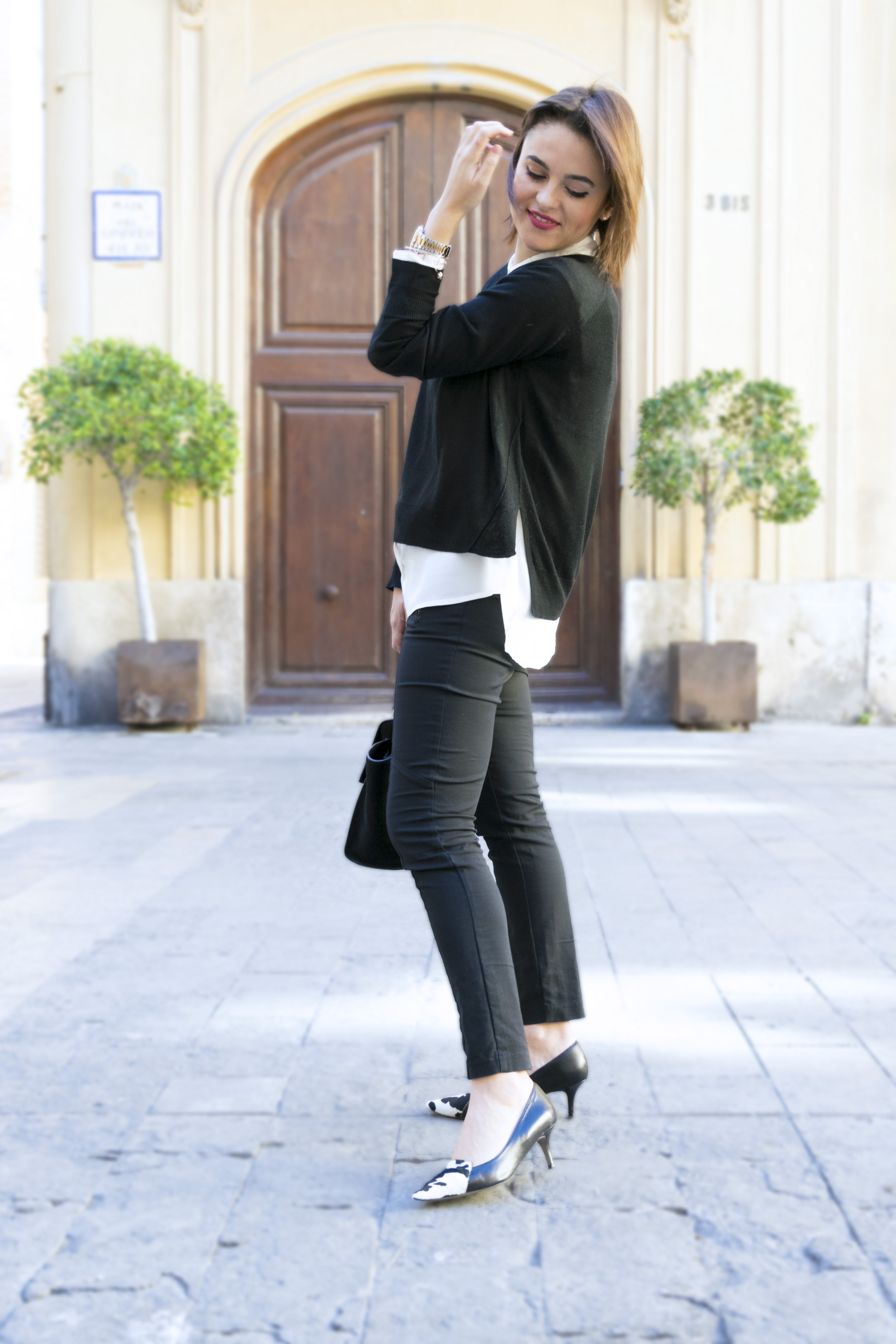 black pants and black sweater to office
